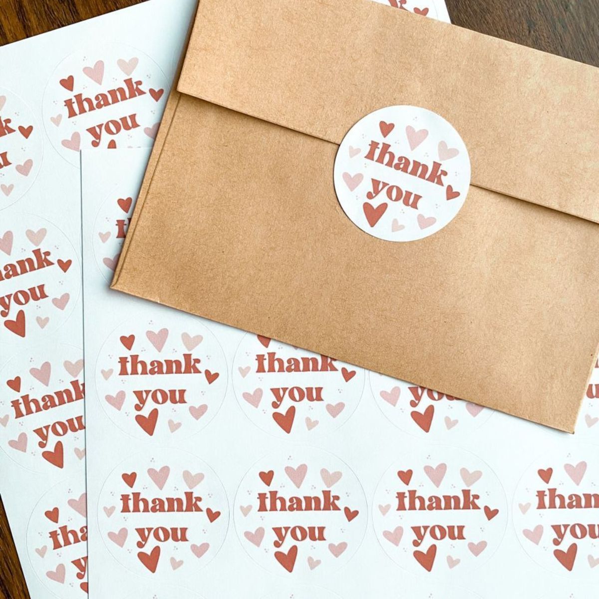 round die cut thank you sticker pasted on brown envelope